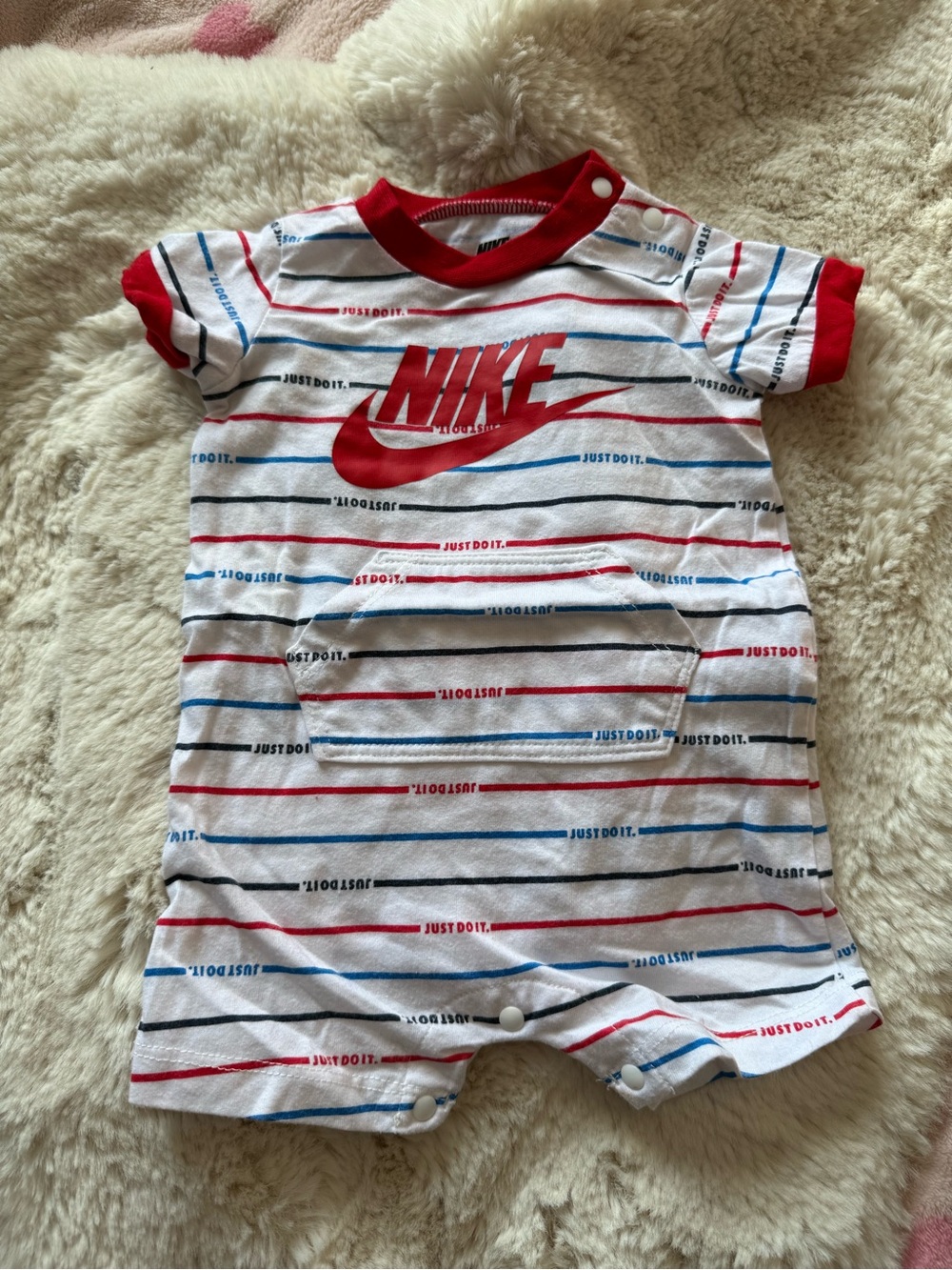 Nike White One-Piece with Red and Blue Stripe Logo